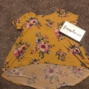 Girls mustard colored floral shirt